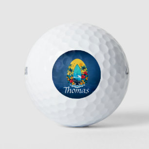 Stylish surfboard with lush tropical flowers. golf balls