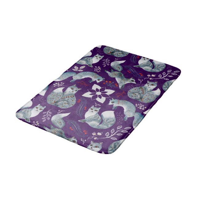  Stylized blue foxes with intricate floral designs Bath Mat (Angled)