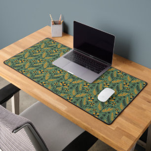 Stylized botanical orange and black floral pattern desk mat