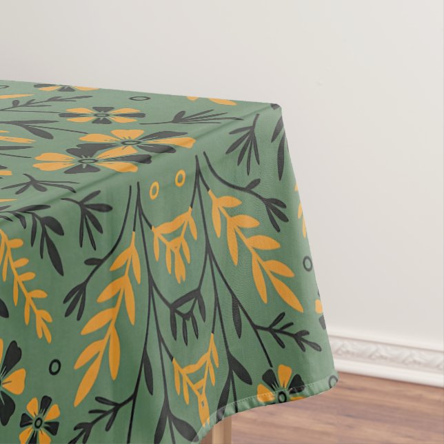 Stylized botanical orange and black floral pattern tablecloth (In Situ)