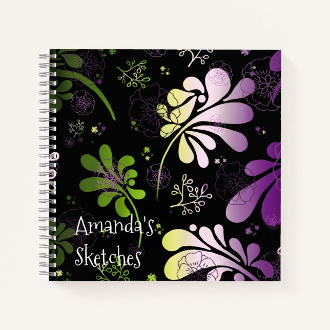 Stylized colourful leaves and flowers on black notebook (Front)