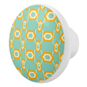 Stylized geometric pattern in bold orange hexagon ceramic knob