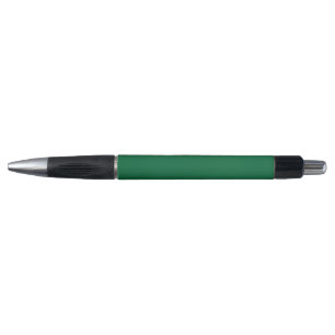 Stylo Un arrière - plan vert profond contrasté par un bl