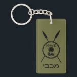 Subdued Maccabee Shield And Spears Keychain<br><div class="desc">A black military "subdued" style depiction of a Maccabee's shield and two spears. The shield is adorned by a lion and text reading "Yisrael" (Israel) in the Paleo-Hebrew alphabet. Hebrew text reading "Maccabee" also appears. The Maccabees were Jewish rebels who freed Judea from the yoke of the Seleucid Empire. Chanukkah...</div>