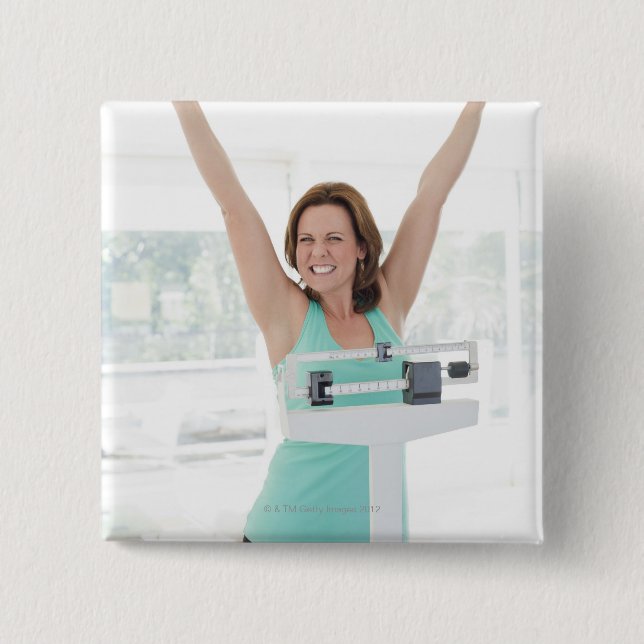Successful weight loss. Happy woman weighing 2 Inch Square Button (Front)