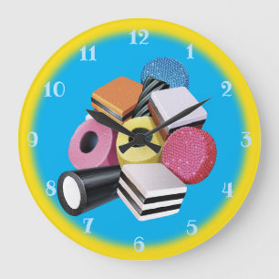 Sucrerie Allsorts. Grande horloge murale. Jaune et