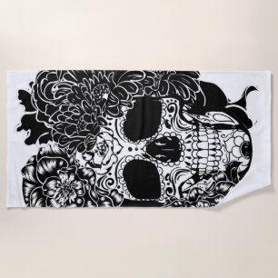 Sugar skull with flowers in black and white beach towel