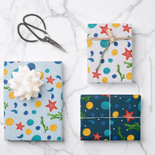 Summer beach with starfish, shells and pebbles wrapping paper sheet