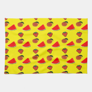 Summer fruits on yellow kitchen towel