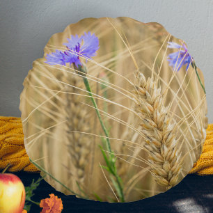 Summer wheat field with blue cornflowers round pillow