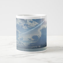 Sun and Clouds Over Water and City Specialty Mug