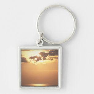 Sun goes down on the ocean keychain