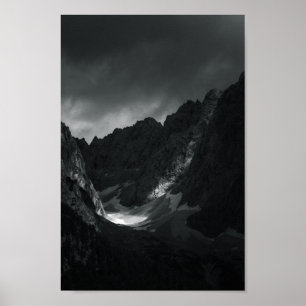 Sun light through dark clouds poster
