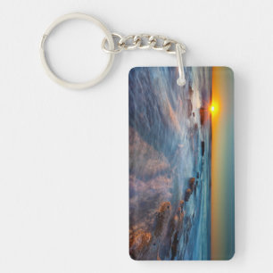 Sun rays illuminate the Pacific Ocean Keychain