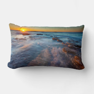 Sun rays illuminate the Pacific Ocean Lumbar Pillow