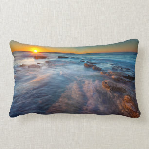 Sun rays illuminate the Pacific Ocean Lumbar Pillow