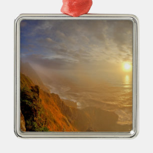 Sun sets over the Pacific Ocean from Heceta Metal Ornament