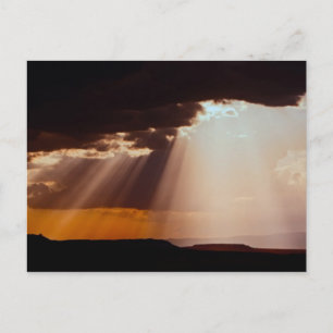 Sun setting on the Masai Mara. 2 Postcard