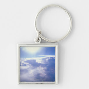 Sun shinning through clouds keychain