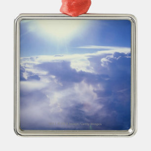 Sun shinning through clouds metal ornament