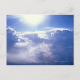 Sun shinning through clouds postcard