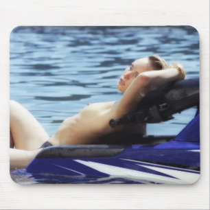 Sunbathing girl mouse pad