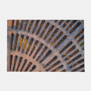 Sunburst Metal Grate In Old Montreal Door Mat