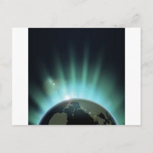 Sunburst over the world globe postcard