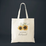 Sunflower Eucalyptus Floral Wedding Bridesmaid Tote Bag<br><div class="desc">Create a modern Sunflower Floral save the date card with this cute template featuring beautiful rustic floral bouquet, geometric gold effect frame, with modern simple typography. TIP: Matching wedding suite cards like RSVP, wedding programs, banners, tapestry, gift tags, signs, and other wedding keepsakes and goodies are available in the collection...</div>
