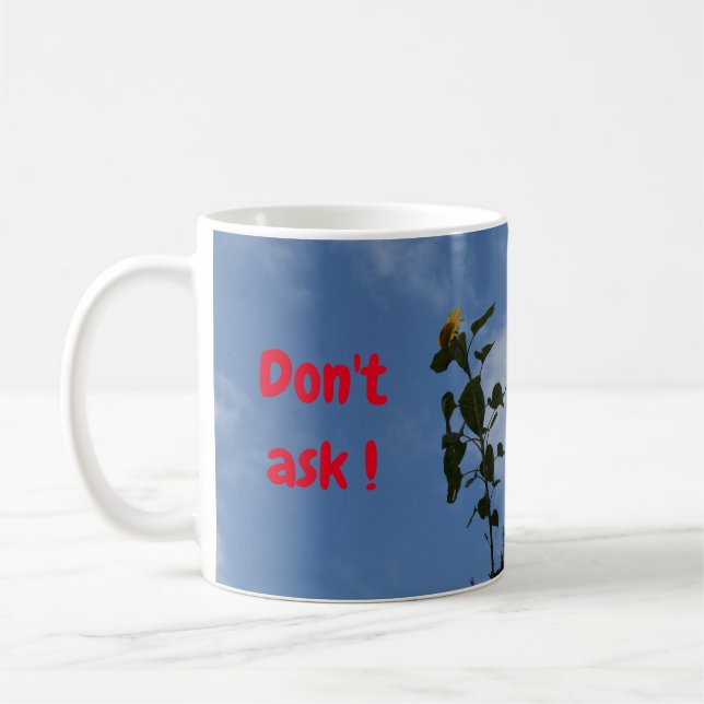 Sunflower on the roof. coffee mug (Left)