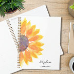 Sunflower Personalized 2024 Planner<br><div class="desc">This simple and stylish Planner is decorated with a yellow watercolor sunflower.
Easily customizable with your name,  and year.
Use the Customize Further option to change the text size,  style,  and colour.
Original Watercolor © Michele Davies.</div>