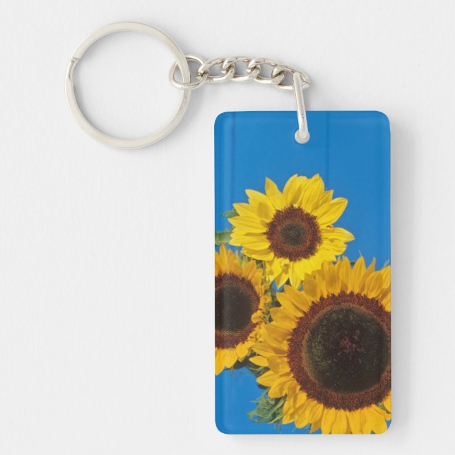 Sunflowers against blue fence keychain (Front)