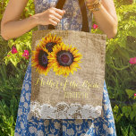 Sunflowers burlap lace wedding mother of the bride tote bag<br><div class="desc">Rustic elegant summer or autumn fall wedding stylish mother of the bride / mother of the groom / bridesmaid / maid of honour / flower girl tote bag on beige faux burlap featuring beautiful yellow gold sunflowers bouquets and white lace borders on both faces. Easy to personalize with bridesmaid's name...</div>