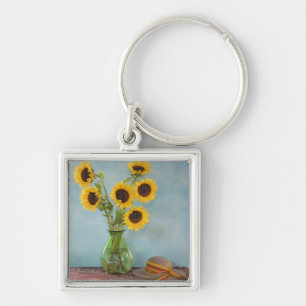 Sunflowers in vase on table keychain