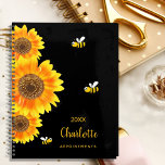 Sunflowers monogram cute bees black 2024 planner<br><div class="desc">A chic black background colour.  Decorated with large watercolored sunflowers and 3 cute,  happy smiling bees.  Personalize and add a name,  year and a title. The name is written in black with a large modern hand lettered style script. Perfect for school,  work or organizing your personal/family life</div>