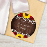 Sunflowers Red Roses String Lights Wedding Classic Round Sticker<br><div class="desc">This wedding sticker design features pretty painted red roses, baby's breath, sunflowers and string lights on a rustic dark wood background. Click the customize button for more flexibility in modifying the text. Variations of this design, different paper types, as well as coordinating products are available in our shop, zazzle.com/store/doodlelulu. Contact...</div>