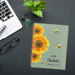 Sunflowers yellow bees sage green name  planner<br><div class="desc">Stay organized in style with our Personalized Sunflower and Bee Spiral Planner, featuring a charming design inspired by nature's beauty. Perfect for planning your days with a touch of whimsy, this planner combines functionality with a delightful aesthetic. Sage green Background: The soft beige backdrop provides a soothing and neutral canvas,...</div>