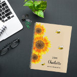 Sunflowers yellow beige bees name  planner<br><div class="desc">Stay organized in style with our Personalized Sunflower and Bee Spiral Planner, featuring a charming design inspired by nature's beauty. Perfect for planning your days with a touch of whimsy, this planner combines functionality with a delightful aesthetic. Warm Beige Background: The soft beige backdrop provides a soothing and neutral canvas,...</div>