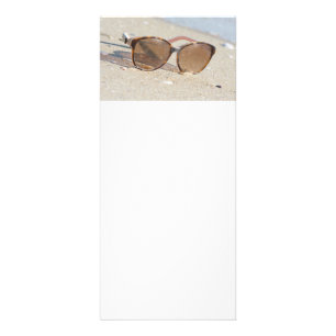 Sunglasses on the beach rack card