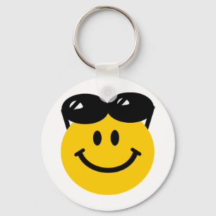 Sunglasses perched on top of head face keychain