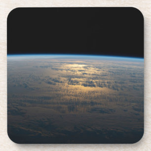 Sunglint Beams Off A Partly Cloudy South Pacific Coaster