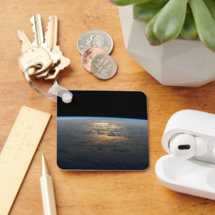 Sunglint Beams Off A Partly Cloudy South Pacific Keychain