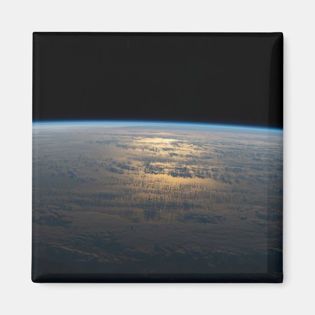 Sunglint Beams Off A Partly Cloudy South Pacific Magnet (Front)