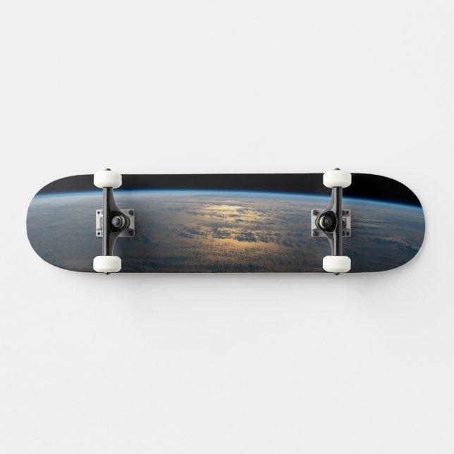 Sunglint Beams Off A Partly Cloudy South Pacific Skateboard (Horz)