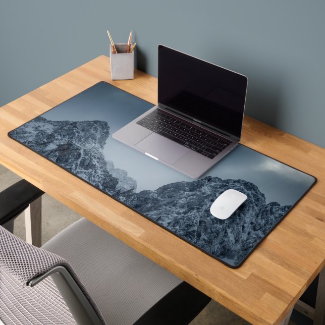 Sunlight and dark clouds over snowy mountains desk mat (Office 2)