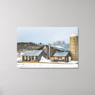 Sunlit Barns and Silos in Winter Canvas Print
