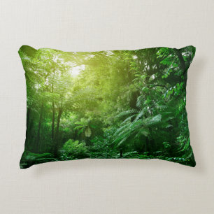 Sunlit tree canopy in tropical jungle accent pillow
