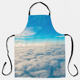 Sunrise above clouds from airplane window apron