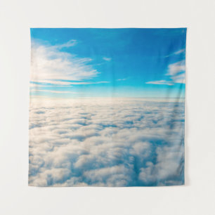 Sunrise above clouds from airplane window tapestry