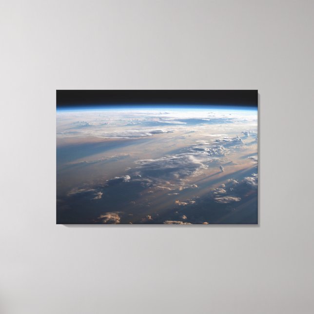 Sunrise Casts Long Shadows Over Philippine Sea Canvas Print (Front)